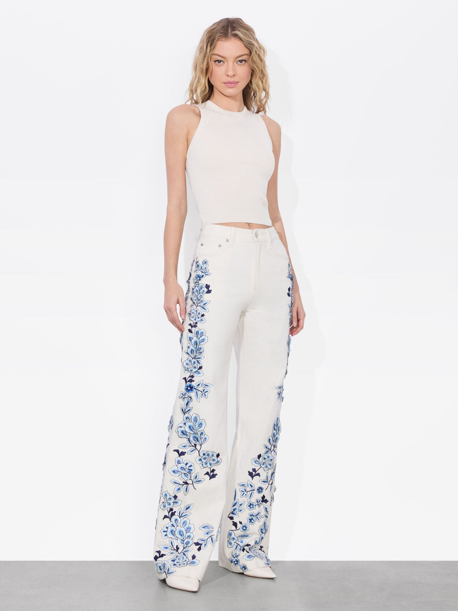 White Flared Jeans with Blue Floral Embroidery