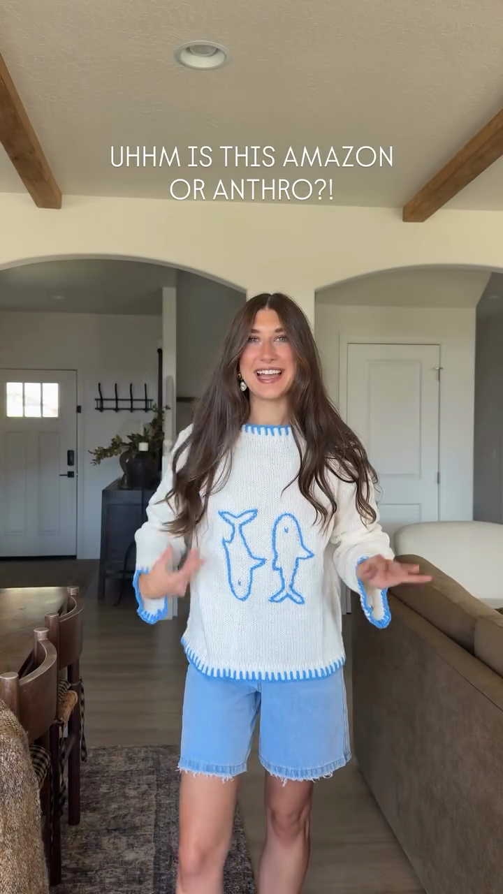 White Knit Sweater with Blue Dolphin Design