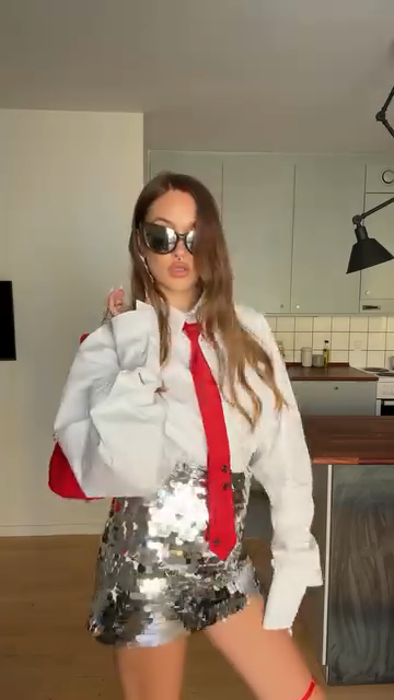 Oversized White Shirt with Red Accents and Sequin Skirt Set