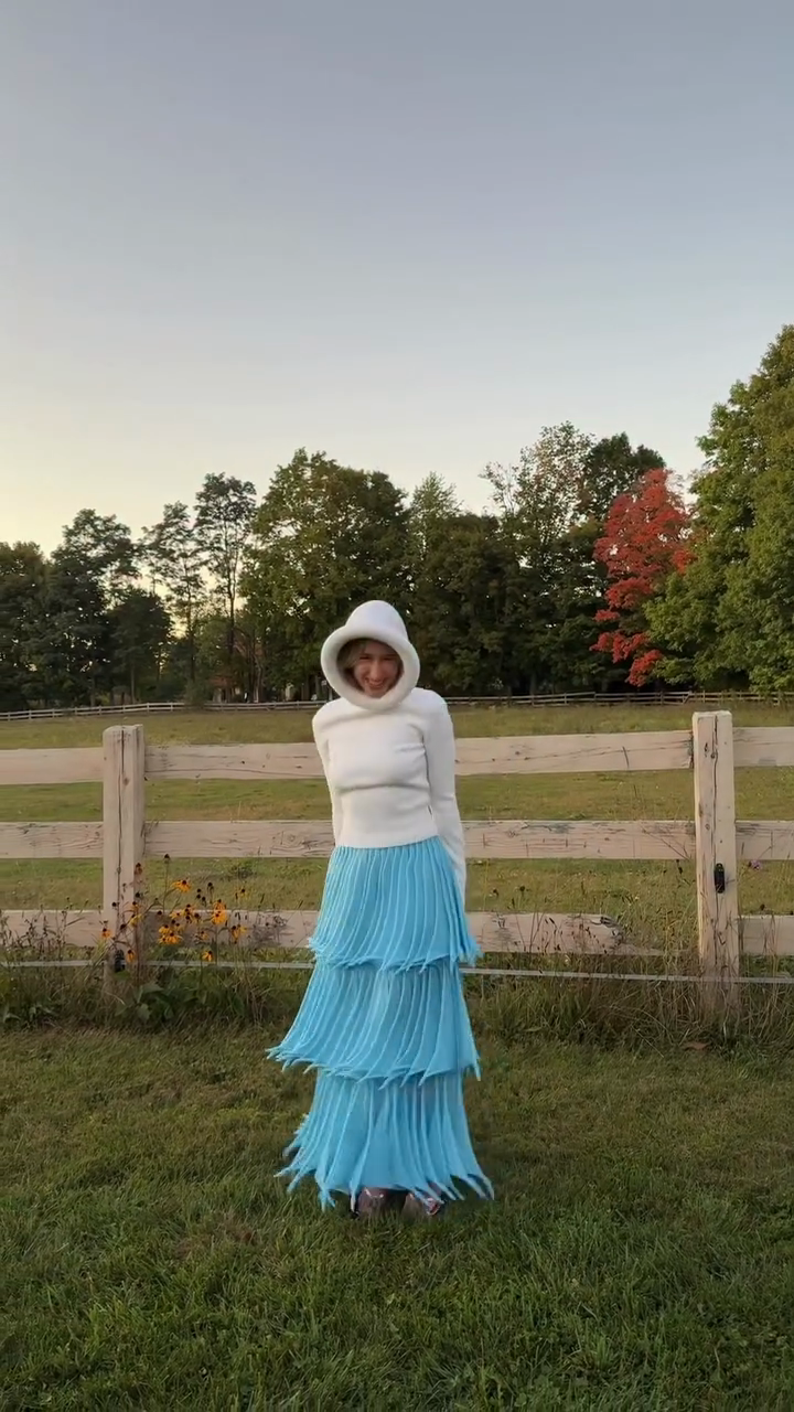 White hooded sweatshirt and light blue layered skirt set