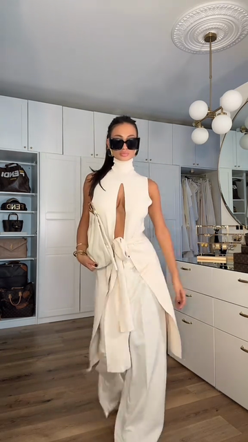 White sleeveless hollow suit