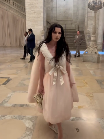 Pink Dress With Cape-Style Overlay and Bow Detail