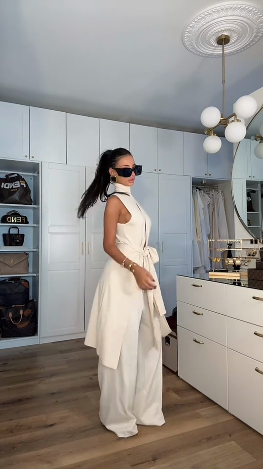 White sleeveless hollow suit