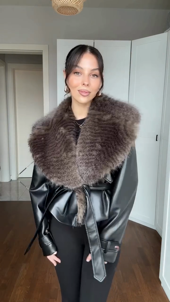 Black leather jacket with faux fur collar