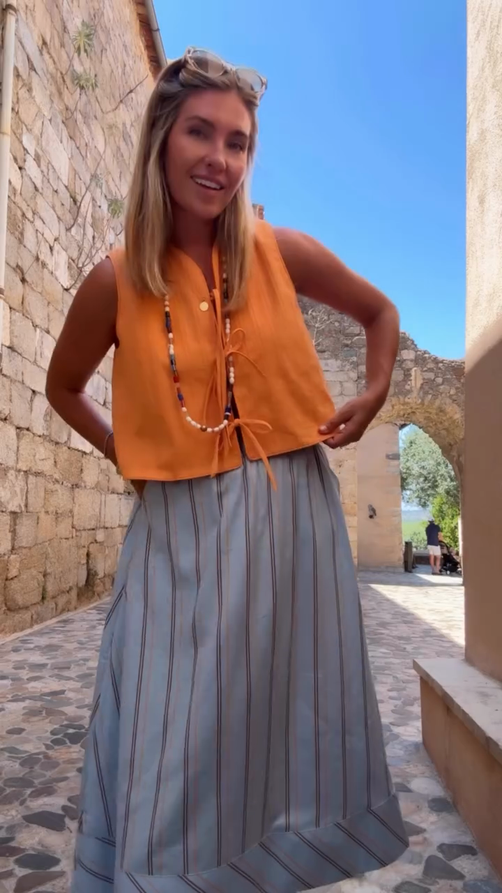 Orange Sleeveless Cropped Top and Striped Midi Skirt Set