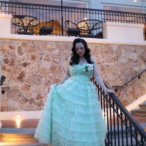 Light Green Strapless Ruffled Ball Gown