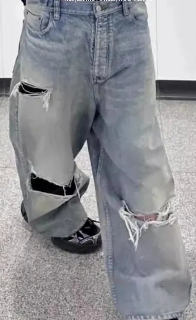 Light Blue Distressed Wide - Leg Jeans